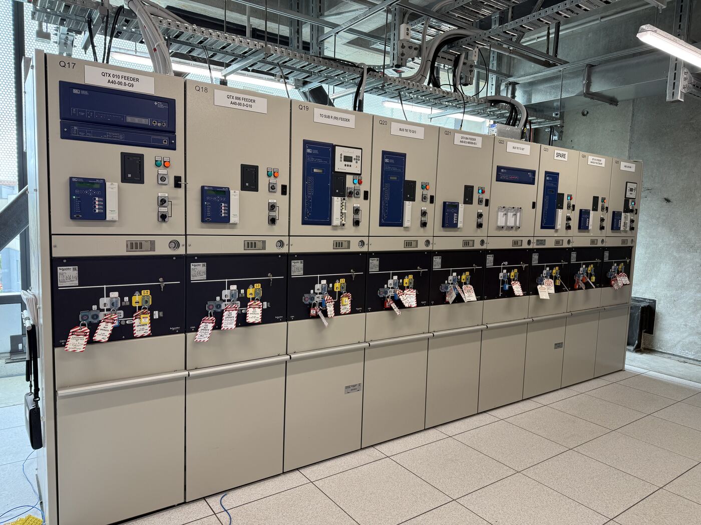11kV switchboard lineup with protection relays, locked off and tagged